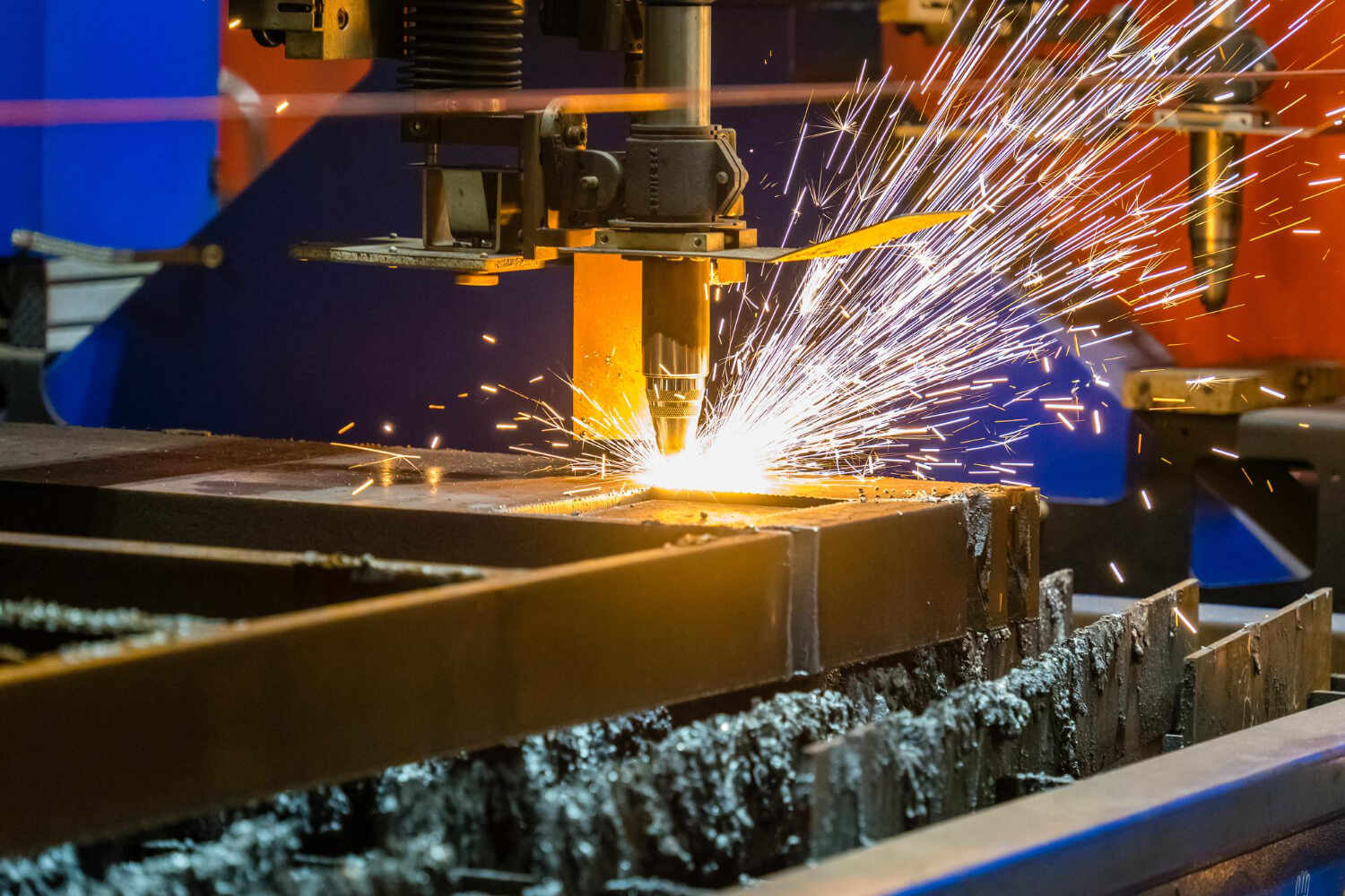 Precision metal laser cutting service in Dubai on steel sheet.