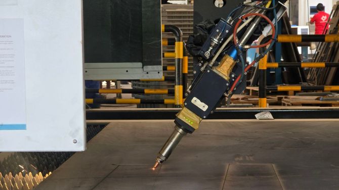 Bevel laser cutting process on steel structure in Dubai industrial project